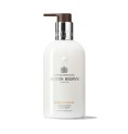 Kroppslotion Molton Brown Flora Luminare 300 ml